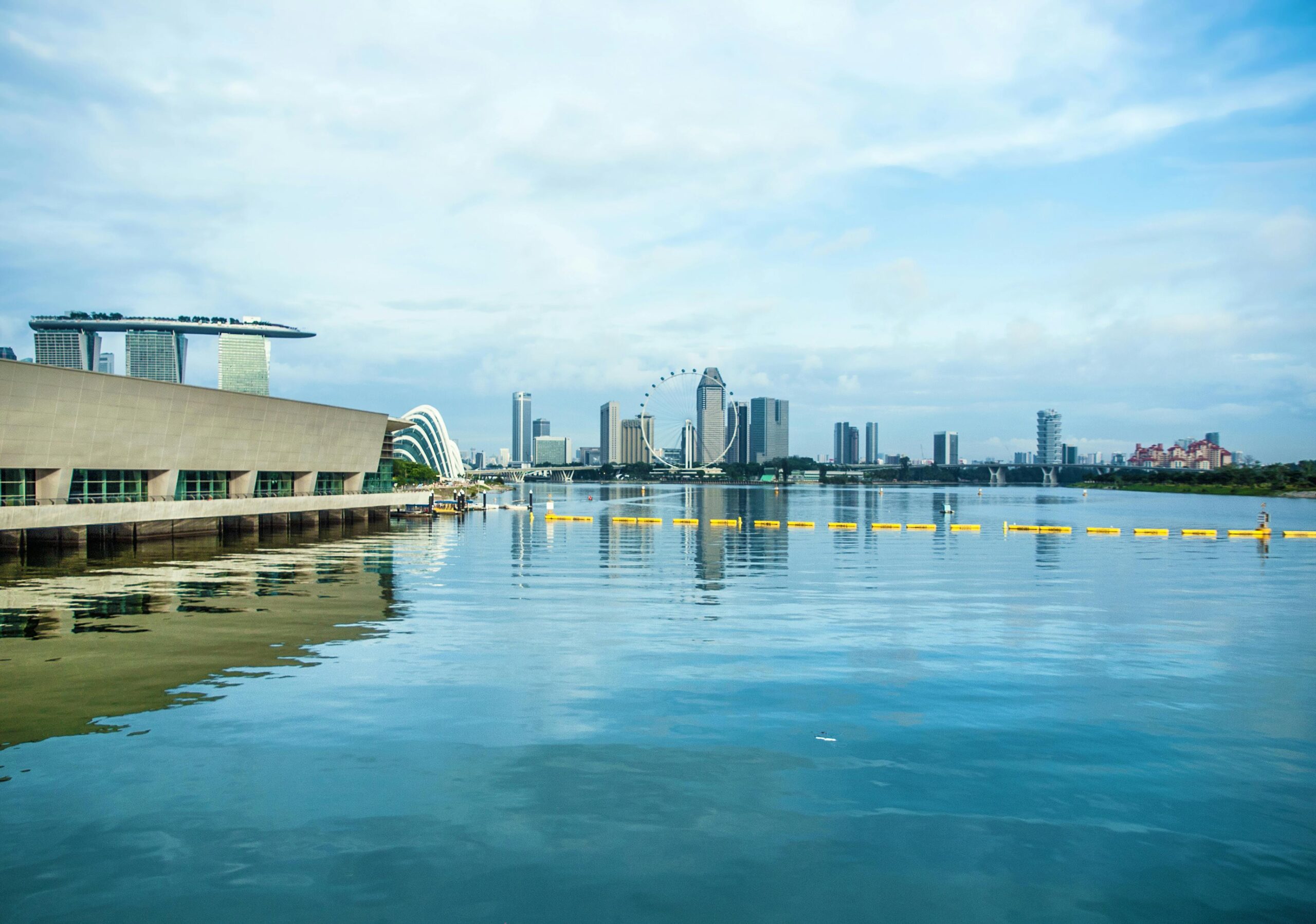 Captivating view of Singapore's Marina Bay skyline with iconic architecture and waterfront reflections.